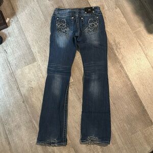 Miss me size 27 jeans note- tear on each heal shown in photo
